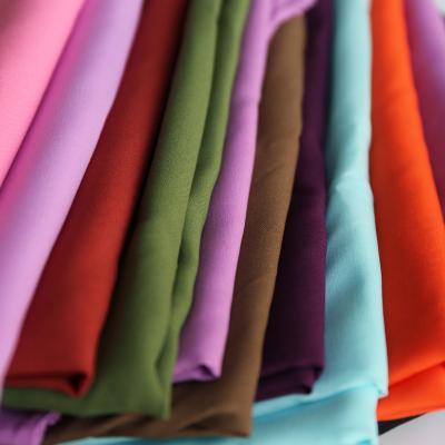 China Colored Recycled100% Interlining Water Soluble Polyester Fabric For Garment Color Interlining 5075D for sale