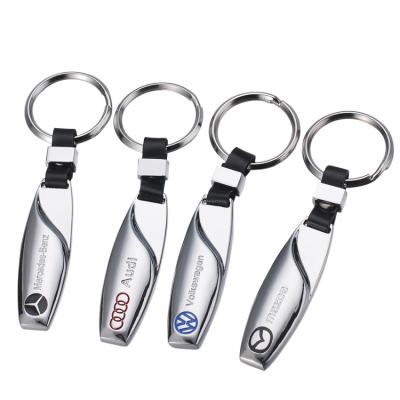 China In stock promotion gift retail drop shape car logo key chain customized your logo hot sales souvenir car key holder for men for sale