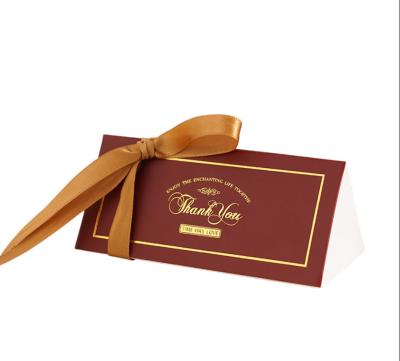 China Recyclable Gift Candy Box Triangle Cone Shape With Gold Foil Logo And Ribbon Silk String for sale