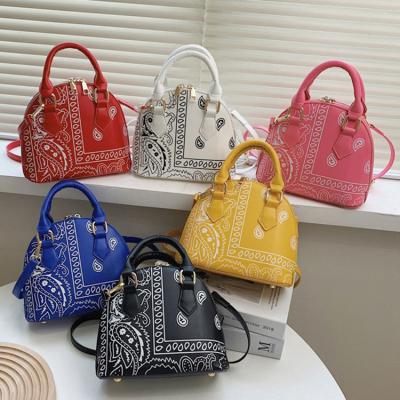 China 2021 High Quality Ladies High Quality Purses and Handbags Grab Makeup Designer Bags Bandana Bag for sale