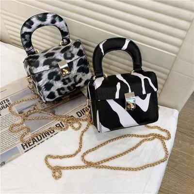 China 2021 high quality fashion round arch handle print box shape mini handbags ladies bags chain animal clutch purse for women for sale