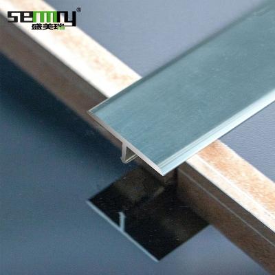 China Free sample modern aluminum alloy accessories T form t trim extrusion profile t channel transition metal tile trim for sale