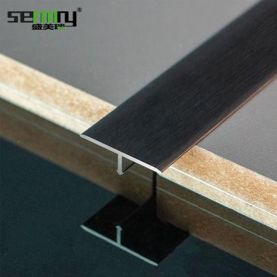 China Free sample modern aluminum alloy accessories T form t trim extrusion profile t channel transition metal tile trim for sale