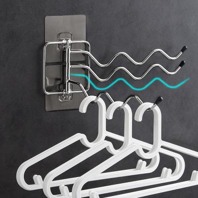 China Modern Bathroom Wall Mounted Adhesive Shelf Shower Rack Towel Holder Stainless Steel Pendant Toilet Paper Holder for sale