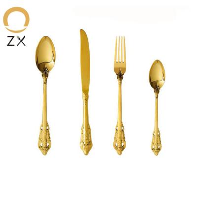 China Sustainable Metal Kings Palace Luxury Golden Stainless Steel Cutlery With Carved Handle for sale