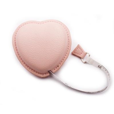 China Eco-friendly Cheap Personal Logo Branded Heart Shape Tailor Tape Measure With Leather Cover For Wedding Gift for sale