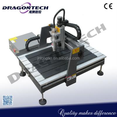 China manual wood engraving machine 6090, DT0609 router, mini cnc engraving machine hobby cnc detachment 0609 with price 600*900*100mm for sale