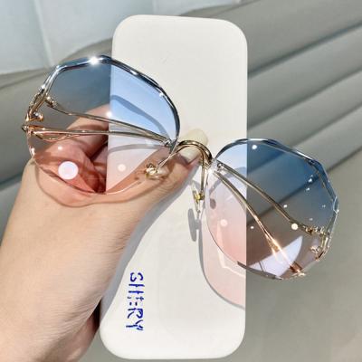 China Hot Selling Retro Fashion Sunglasses UV Protection Ladies Polygonal Sun Glasses Frameless Glass Edge Cut Sun Lenses for sale