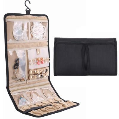 China Small Travel Jewelry Roll Bag Organizer with Hanging Holder Portable Pocket Travel Jewelry Organizer Roll Bag Case with Zipper Pocket Compartments for Earrings Bracelets Necklaces for sale