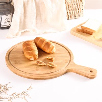 China Sustainable Bamboo Pizza Skin With Short Handle Round Pizza Board for sale