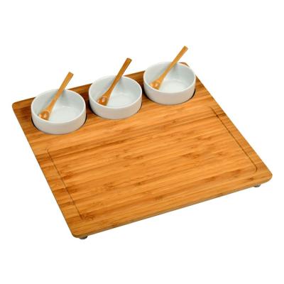 China Personalized Viables Picnic Cheese Charcuterie Serving Engraved Bamboo Cutting Board with 3 Ceramic Bowl and Spoons for sale