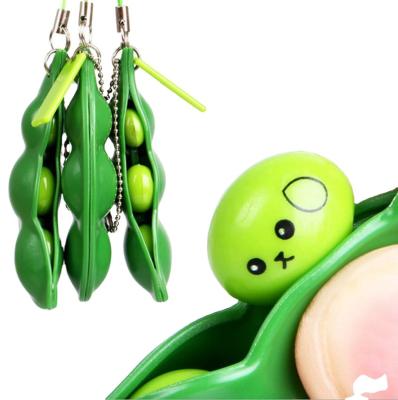 China Stress Reliever Noise Trigger Squeezed Bean Pea Pods Phone Bag Trigger Toy For Kids And Adults Decompression Toys Key Chain Toy for sale