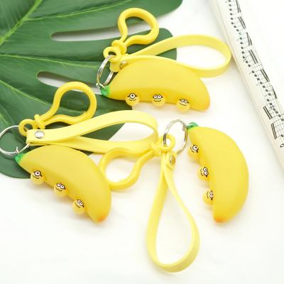 China Wholesale Custom Soft 3D PVC Key Chain Banana Squeeze Toys Simple Pop Sound Stir Sensory Toys Set Game for sale