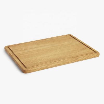 China Oak Chopper Wooden Large Sustainable Solid Cutting Board With Juice Groove for sale