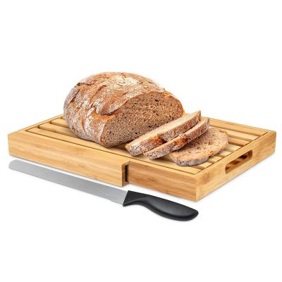 China 2022 Sustainable Multifunctional Bamboo Wooden Bread Cutting Board With Knife / Bread Tray With Crumb Catcher for sale