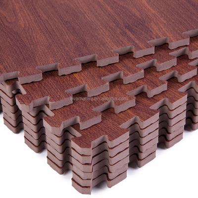 China Stain Resistant 9 Pieces Eva Foam Mat Interlocking Tiles Protective Flooring With Boarders Dark Wood Grain for sale