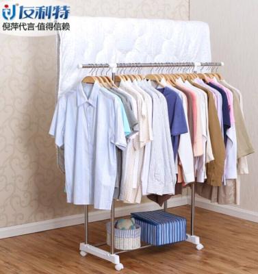 China Free Standing Steel Pipe Telescopic Clothes Rack for Home Furniture , Clothing Display Racks for sale