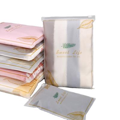 China 13 Years Plastic Bags Recyclable Frosted Seal Large Print Zipper Bags Recyclable Spot Apparel Packaging Bags for sale