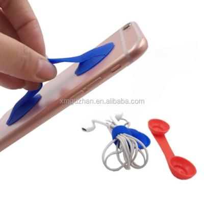 China Non-Toxic Custom Silicone Phone Shape Double Suckers Silicone Cell Phone Holder for sale