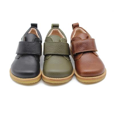 China New round leather children's shoes soft unique students sport pure handmade sneakers buckles children's shoes for sale