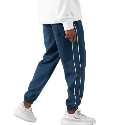 China Autumn Men Casual Loose Wide Waist Leg Sweatpants Breathable Drawstring Cotton Polyester Wild Straight Track Pants Casual Sports Trousers for sale