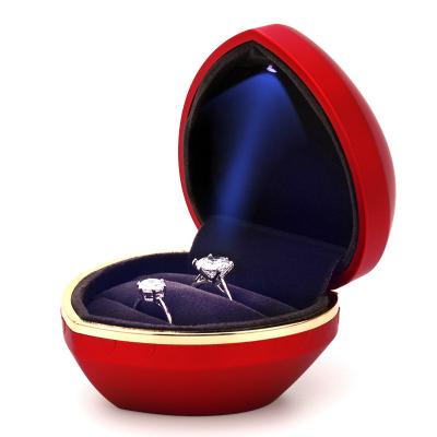 China Factory Newest Custom Gold Edge Heart Shaped Ring Box With Led Light Pendant Necklace Jewelry Storage Box Rings Romantic Packaging for sale