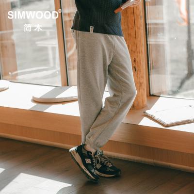 China 2022 New SIMWOOD Winter Mens Tracksuit Warm Fleece Jogger QUICK DRY Loose Pants Wholesale Gym Wear Plus Size Unisex Sweatpants for sale