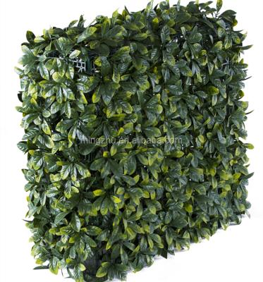 China Customized easily assembled waterproof artificial decor pe leaf wall hedge for sale