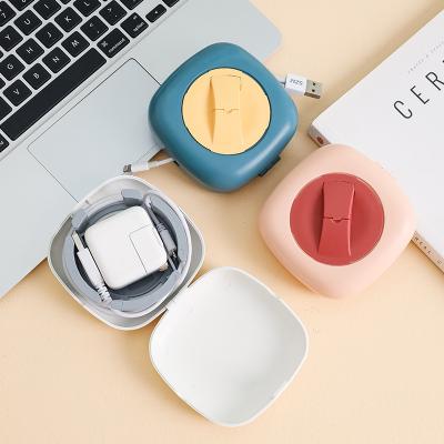 China Rotatable Sustainable Cable Management Winder Cord Organizer for Desktop Cable Clamps Cable Wire Plastic Organizer for sale