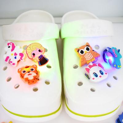 China Shoe Charms Wholesale LED Light Shoe Accessories Glow in Dark Charms for Kids Party Favors for sale