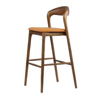 China Durable Nordic Modern Simple Wooden Bar Umpire Chair Upholstered Personality Wooden Bar Stool Solid High Stool for sale