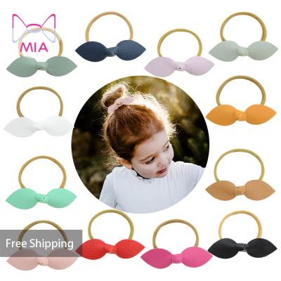 China Mia Free Shipping Fashionable Small 4 Inch Leather Bowknot Hair Bow With Elastic Hair Band Baby Hair Accessories for sale