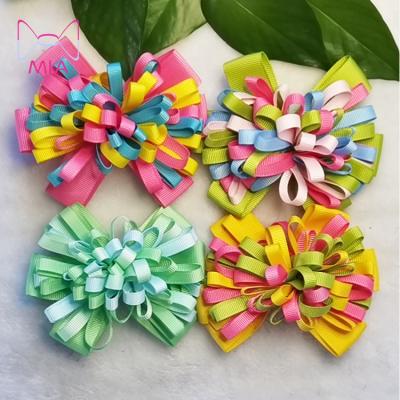 China Fashionable 4 Inch Firework Novelty Ribbon Hair Twisted Puffs Bow With Clip For Toddler Girl for sale