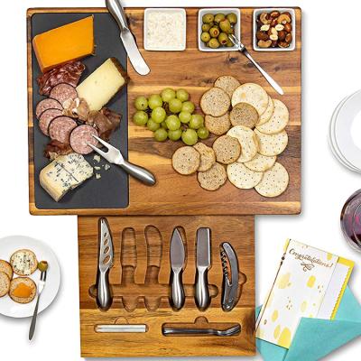 China Sustainable Hot Amazon Serving Tray Acacia Wood Cheese Board Set With Cutlery In Slide Out Drawer Cheese Tray Cutting Board for sale