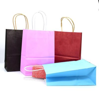 China Eco-friendly Recycled Materials Kraft Paper Clothes Bag Custom Logo Flat Handle Kraft Paper Shoes Bags Grocery for sale