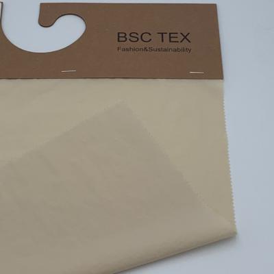 China Full Dull 40D Taffeta Crinkle Recycled Ripstop Nylon Fabric 65gsm for sale