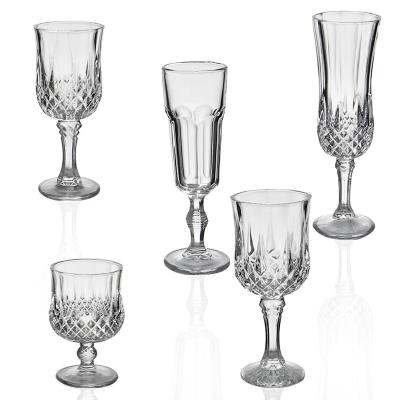 China Drop Resistant Wholesale European Style Embossed Transparent Wine Glass Water Goblet for sale