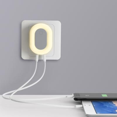 China 2.1A fast charge & Foldable Led Night Glow Charger Night Light Smart Charger USB Wall Light Dual Adjustable Mobile Phone Fast Charging Plug Plug for sale