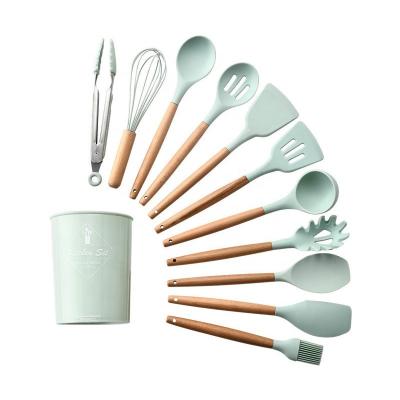 China Sustainable Hot Sale 11 Pcs Kitchen Utensils Cooking Set Wooden Handle Silicone Cookware Set for sale