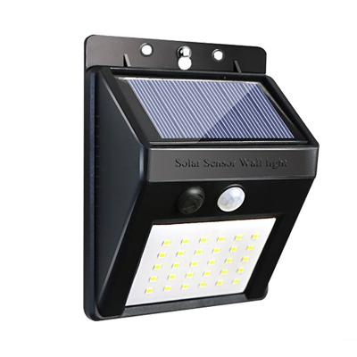 China Polycarbonate Led Pir Motion Sensor Wall Light 20led Power Solar Street Yard Path Garden Outdoor Waterproof Energy Saving Lamp for sale