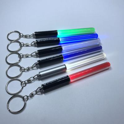 China Customized colorful Star Wars LED lightsaber keychain lightsaber keychain logo acrylic stick LED light metal promotion gifts for sale