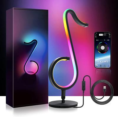 China New-designed 180 Degree Rotating Smart Musical Note RGB Table Lamp Ambient Bedroom Bedside Lamp Led Night Light for sale