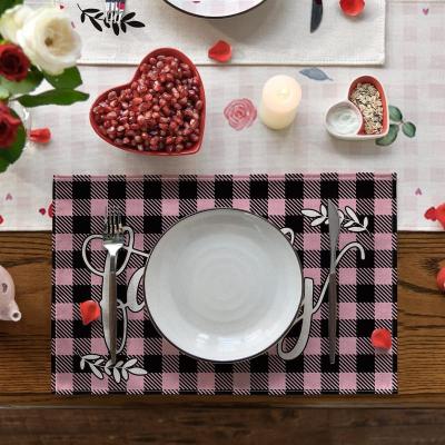 China XOXO Washable Rustic Washable Kisses Hugs Plaid Red Heart Valentine Place Mats For Dining Table for sale