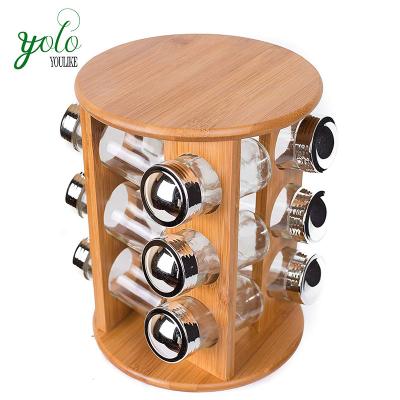 China Viable Bamboo Spinning Spice Rack with 12 Spice Glass Jars for sale