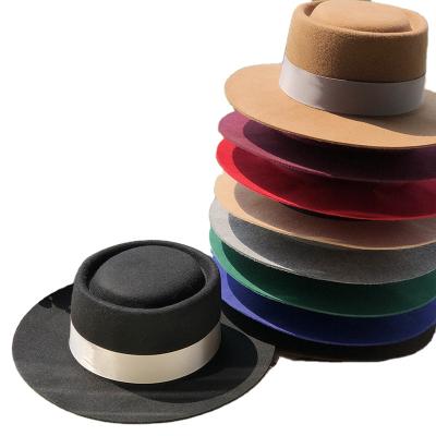 China Large Picture Manufacturer Price High-Grade Round Wool Flat Surface Hat Brim Trilby Fedora Hat for sale