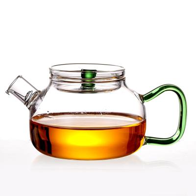 China Sustainable Wholesale Chinese Mini Pyrex Infuser Glass Teapot Borosilicate With Color Handle for sale