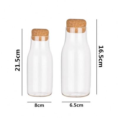 China Hot Sale High Borosilicate Bottle Glass Stocked Storage Bottle With Wooden Lid for sale