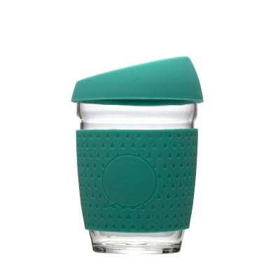 China Sustainable Hot Sale Fashion Glass Coffee Mug Eco-Friendly Reusable Drinking Cups With Silicone Lid for sale