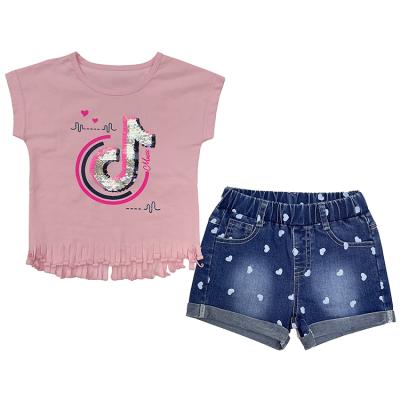 China Custom Casual Kids Girl Summer 2 Piece Clothing Set Tik Tok Sequin Short Sleeve Letter Shirt and Printed Jeans for sale