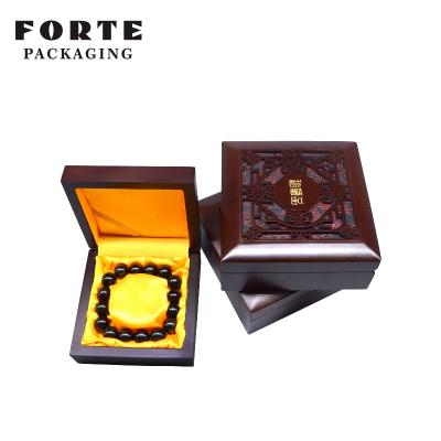 China FORTE Fashionable high end obsolete stiff wood carved jewelry case bracelet earrings ring jewelry boxes with logo for sale